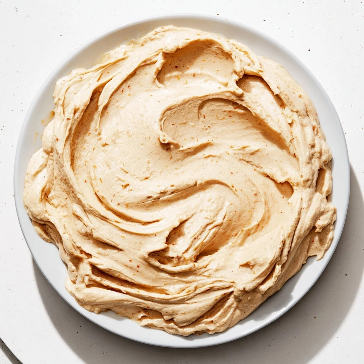 Delicious, dairy-free Peanut Butter Banana Ice Cream, perfectly blended with hints of banana and nutty flavor.