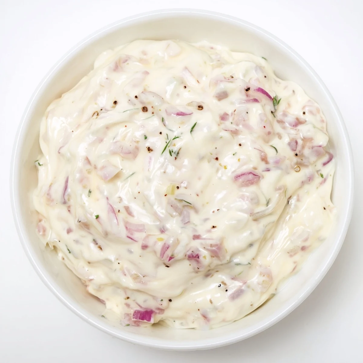 A close-up of a bowl filled with sweet and sour pickle relish dip, ready to be enjoyed.