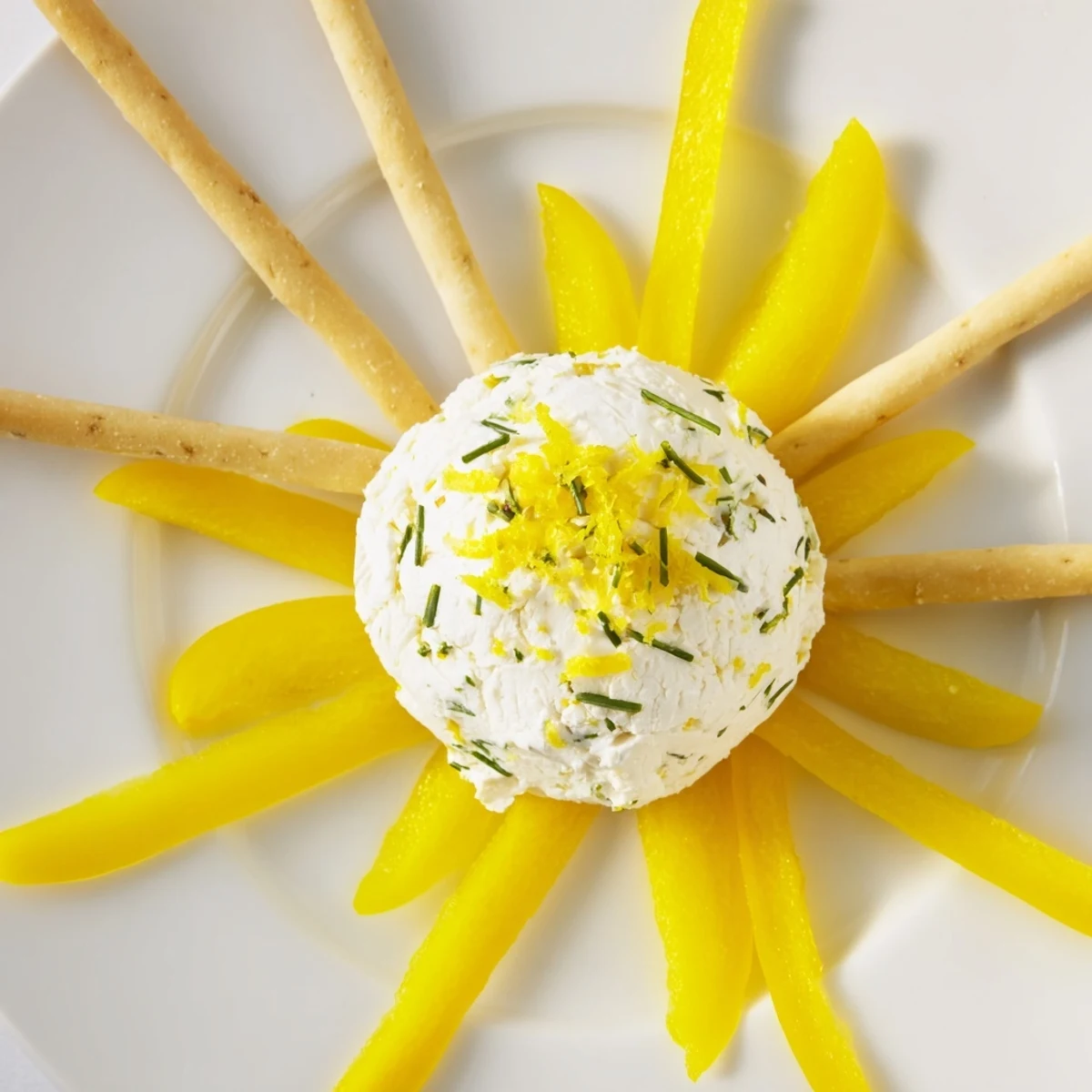 Easy summer entertaining: the Tuscan sunburst appetizer showcases fresh goat cheese and breadsticks.