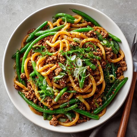 Sizzling ground turkey and green beans tossed with udon in a rich 20-Minute Garlic Butter sauce.