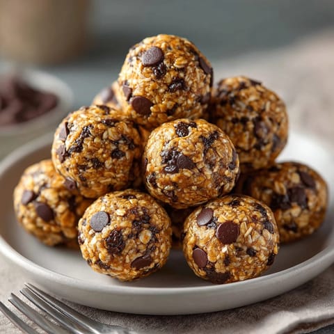 Close-up of protein-loaded cookie dough energy balls, ready to serve as a healthy snack.