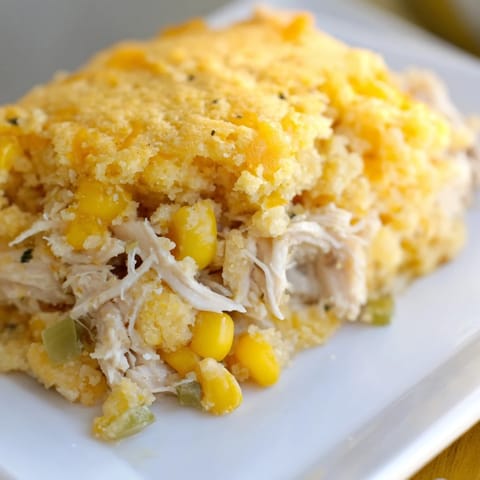 Creamy Southern Cornbread Chicken Casserole showcases tender chicken under a fluffy cornbread topping.